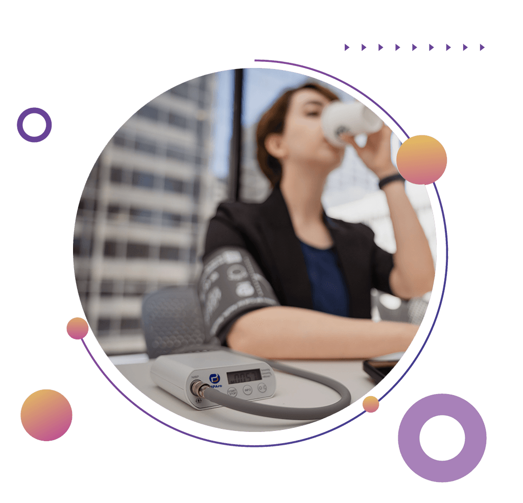 Woman checking her blood pressure at home